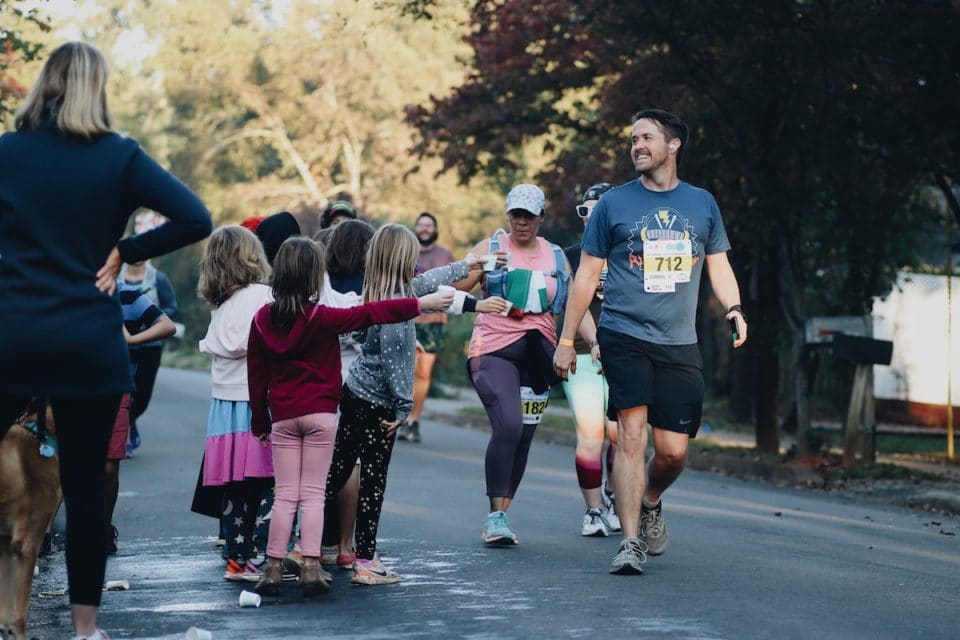 Runner getting water